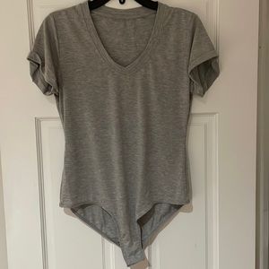 Short sleeve gray v neck bodysuit in size medium
